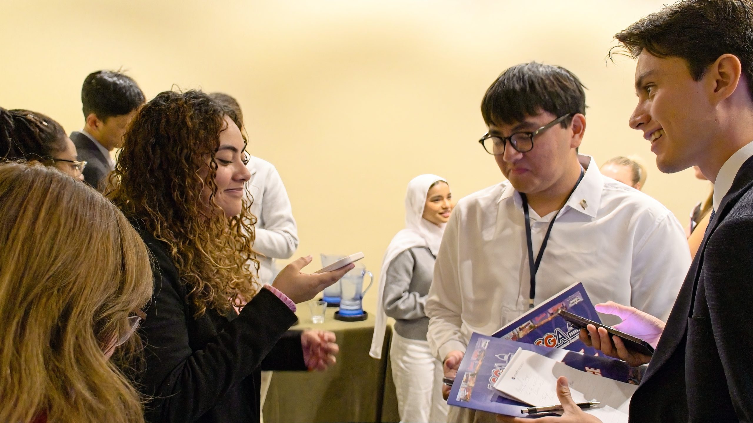 Students reviewing ASGA materials