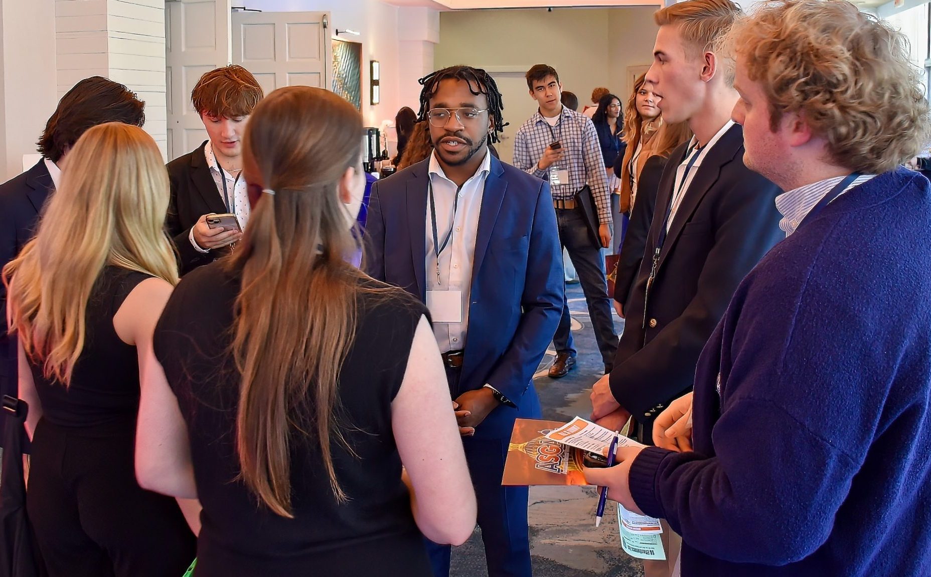 Students networking at an ASGA conference